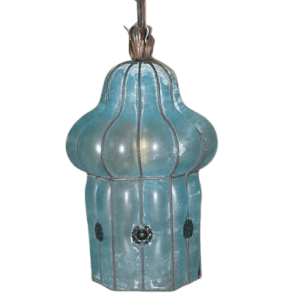 A beautifully crafted pendant light featuring a curvy, ornate design in a soft blue hue. The elegant shape is complemented by subtle metallic accents and a central decorative element, creating a warm and inviting ambiance. Ideal for enhancing any space with a touch of traditional artistry.