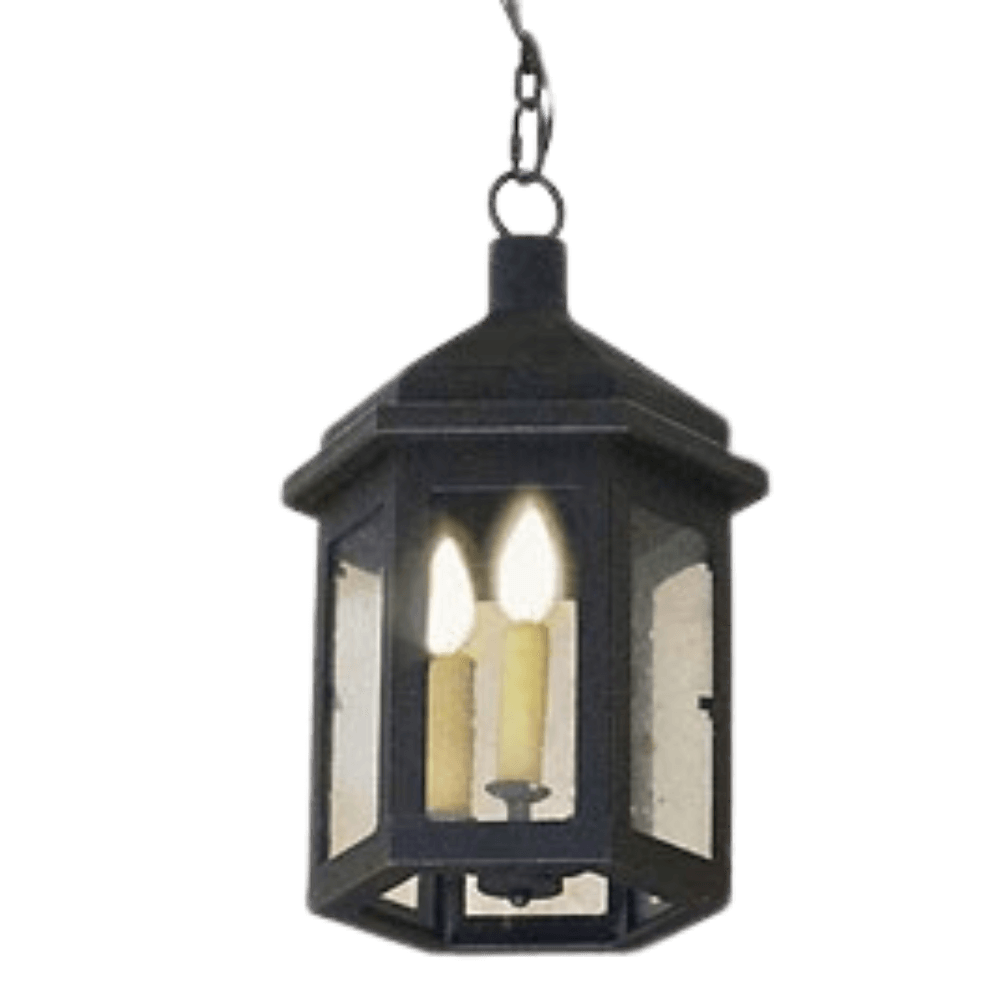 A classic hanging pendant featuring a hexagonal design, finished in a rich dark hue. It illuminates with two flame-shaped bulbs behind clear glass panels, adding warmth and elegance to any space.