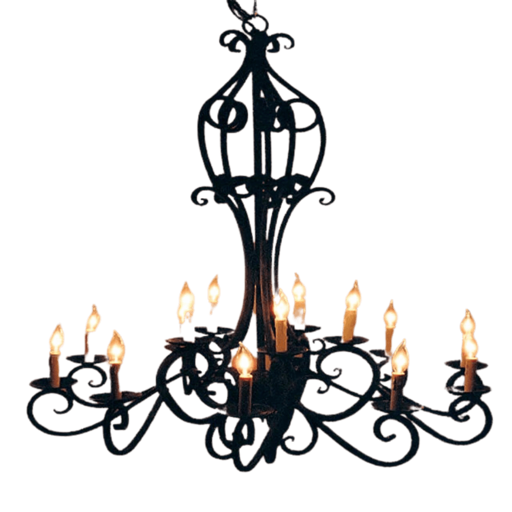 An ornate wrought iron chandelier featuring intricate scrollwork and multiple candle-like bulbs. The design showcases a striking balance of elegance and artistry, illuminating spaces with warmth and character.