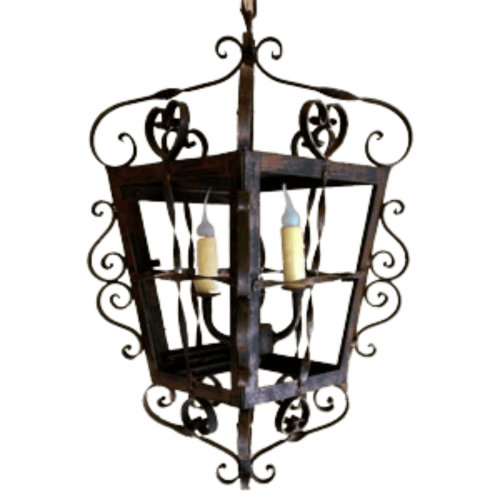 A beautifully crafted wrought iron chandelier featuring an intricate design with swirling accents and space for two candle-like bulbs. The rustic finish enhances its elegant charm, making it a stunning focal point for any room.