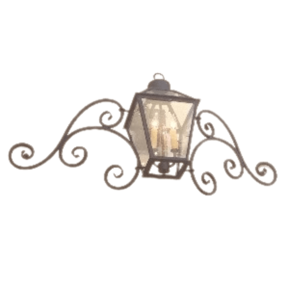 A decorative wall sconce featuring an elegant wrought iron frame with intricate swirling designs. The light fixture showcases a clear glass lantern that holds three candle-like bulbs, exuding a warm and inviting ambiance.