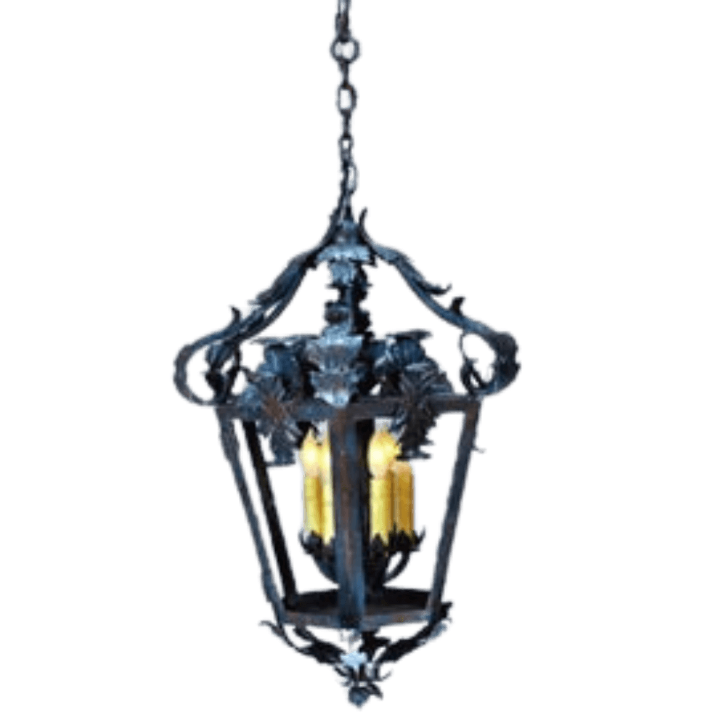 A beautifully crafted pendant featuring ornate wrought iron detailing and three candle-style lights. The design incorporates intricate curves and floral accents, adding elegance to any space.