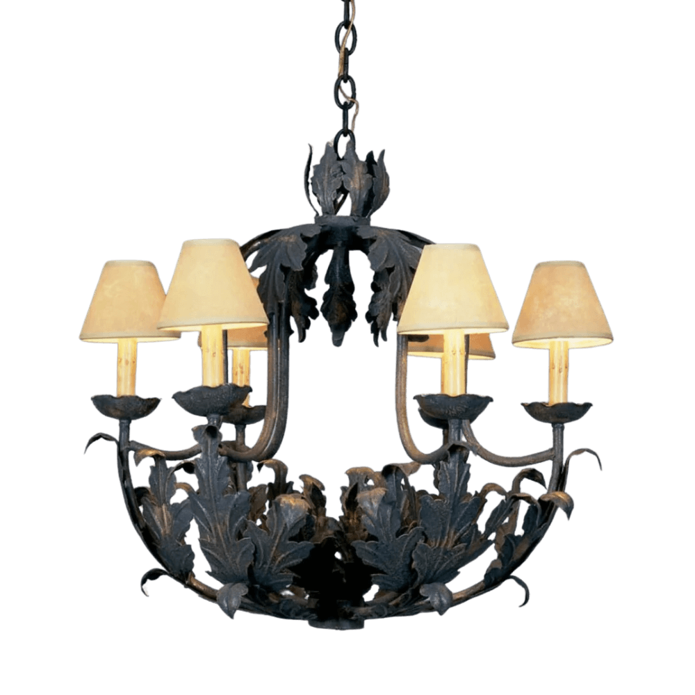 A decorative chandelier featuring intricate wrought iron work and elegant leaf motifs, complemented by softly tinted shades that create a warm glow.
