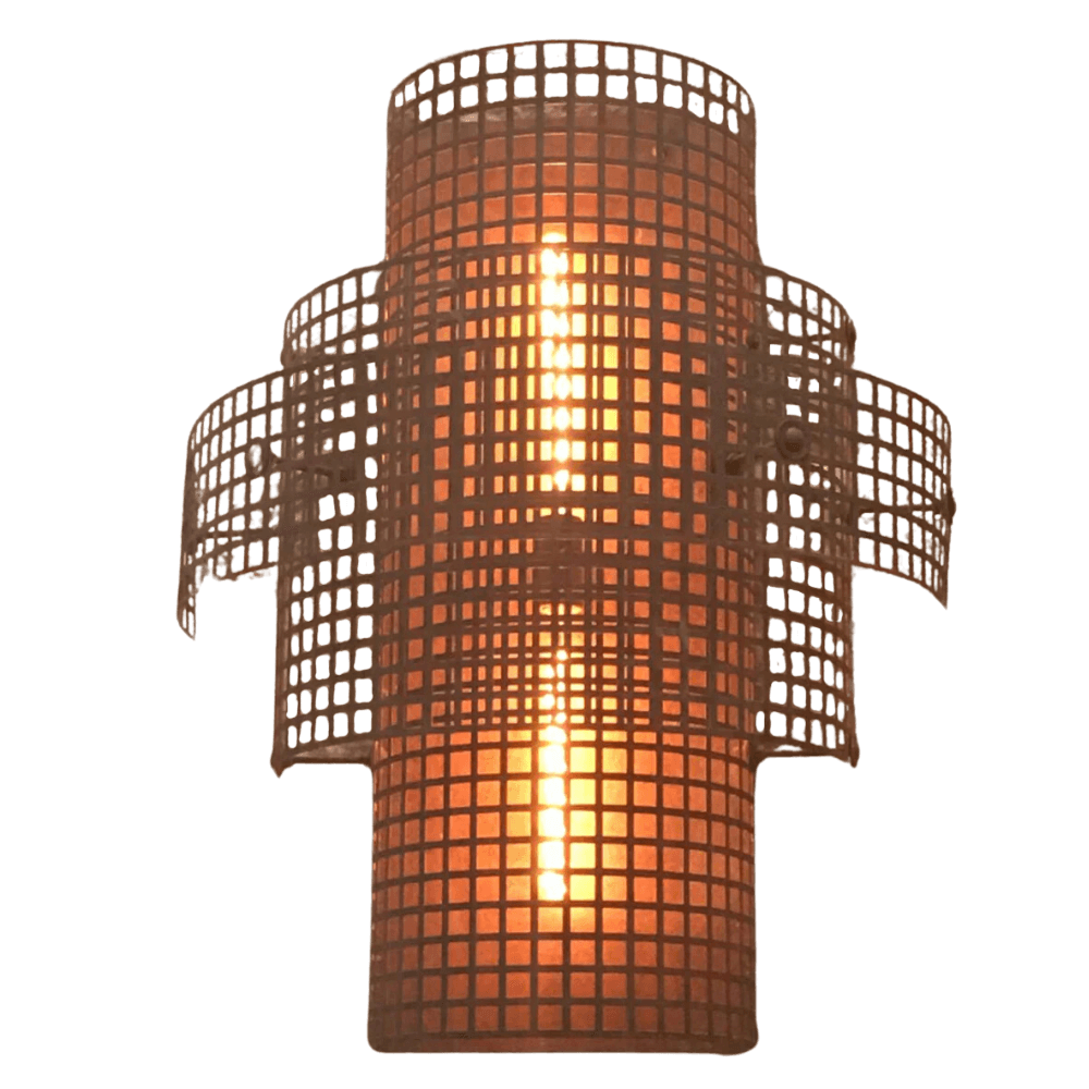 A beautifully designed wrought iron sconce featuring a cylindrical shape with an intricate grid pattern, housing a warm, glowing light source in the center. The fixture combines elegance and artistry, perfect for enhancing any interior space.