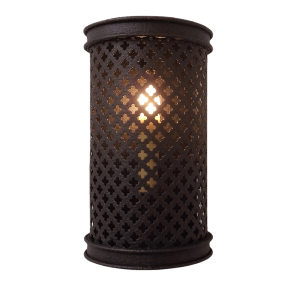 A beautifully crafted wrought iron sconce with intricate lattice detailing. The design allows light to filter through, creating captivating patterns on the surrounding surfaces. This fixture adds a touch of elegance and warmth to any space.