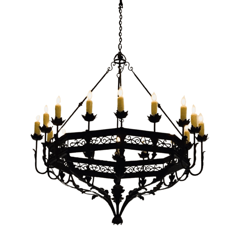 A large wrought iron chandelier featuring intricate scrollwork and multiple candle-like lights. The design showcases elegant craftsmanship, with a dark finish that enhances its dramatic appeal, making it a striking focal point for any room.
