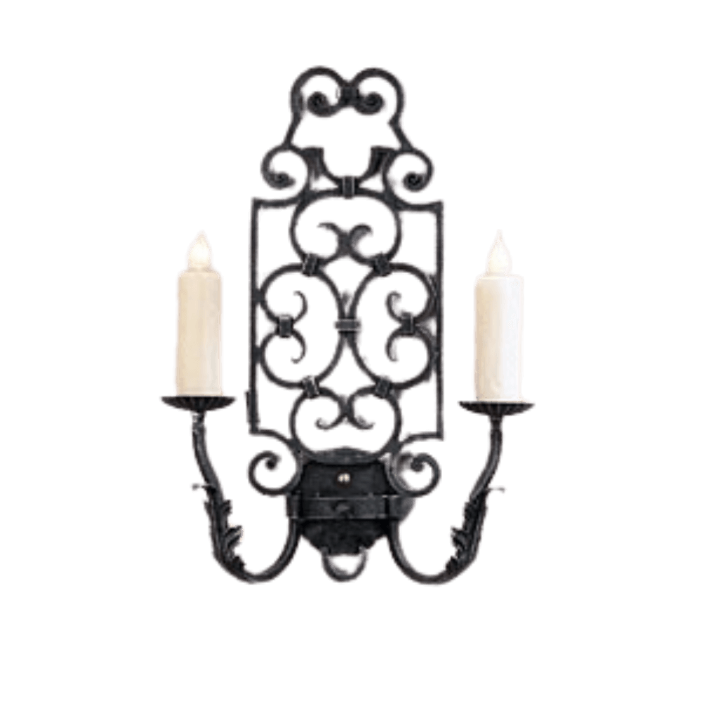 A decorative wrought iron wall sconce featuring intricate scrollwork and two candle-style lights. The elegant design adds a touch of vintage charm to any space.