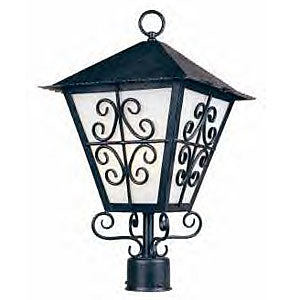A beautifully crafted wrought iron outdoor sconce featuring intricate scrollwork and a sleek glass panel, perfect for enhancing your home's exterior.
