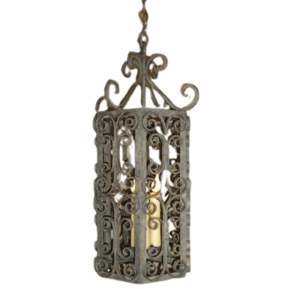An intricately designed wrought iron pendant light featuring ornate scrollwork and a warm glow from its central bulb, ideal for adding elegance to any space.