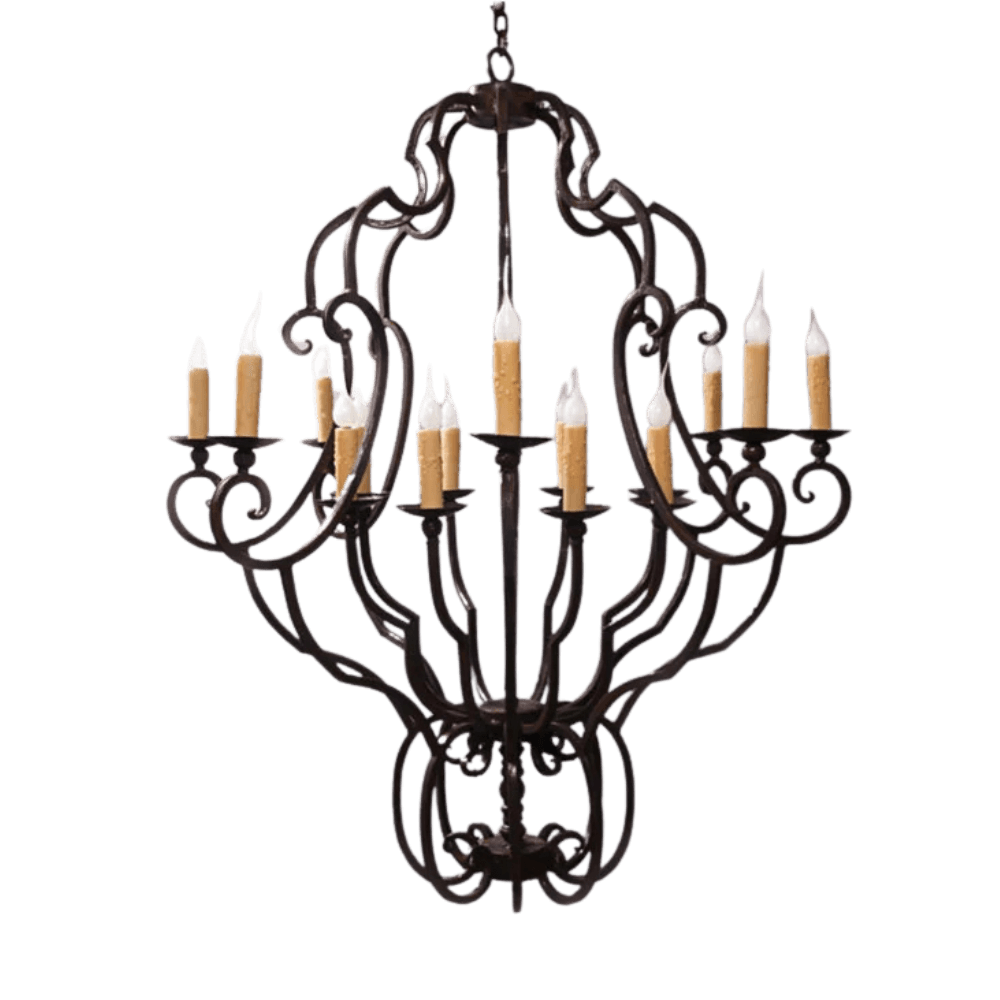 Intricate wrought iron chandelier featuring elegant curves and designs with twelve candle-style lights. The design adds a warm and inviting ambiance to any space.