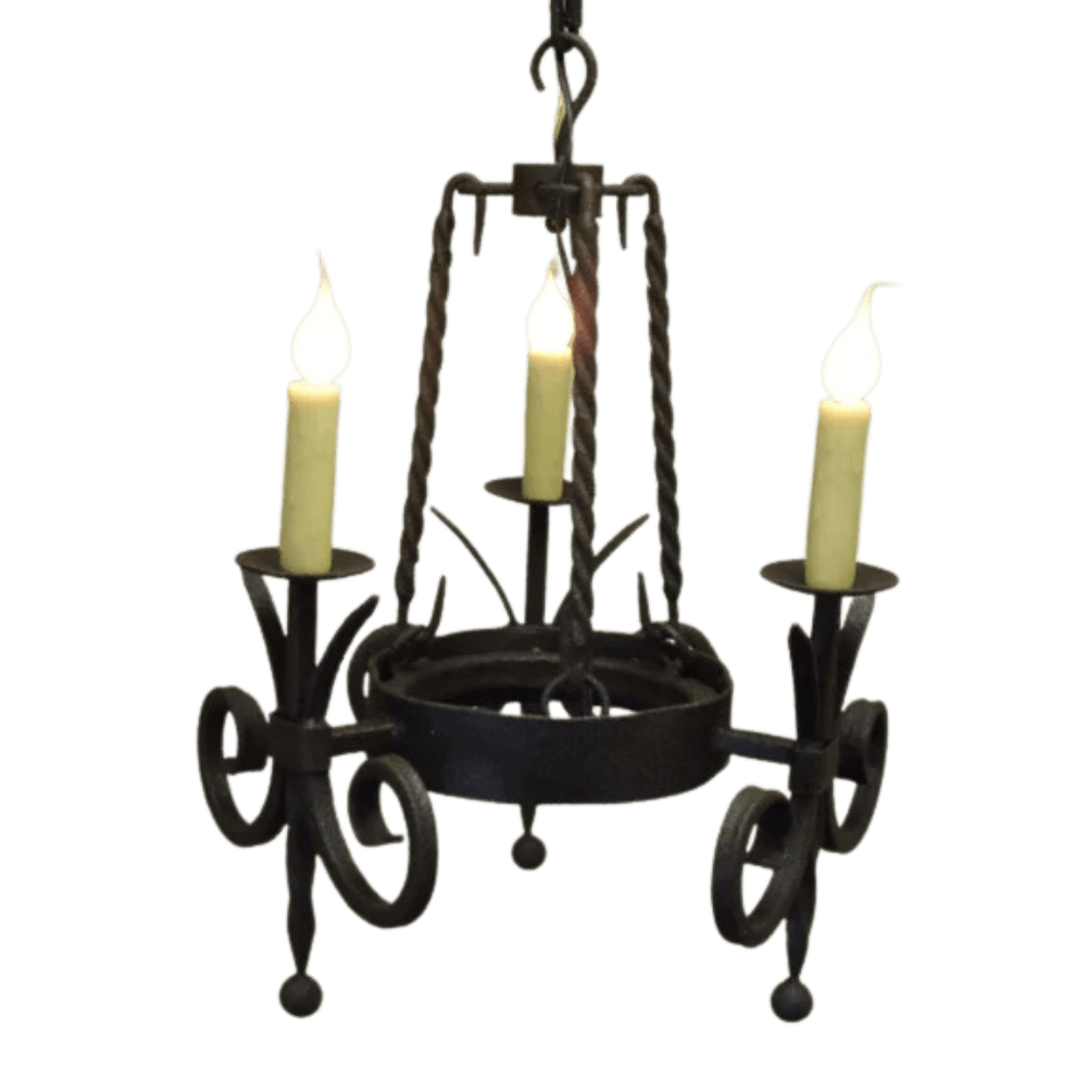 A handcrafted chandelier featuring elegant wrought iron design, adorned with three candle-style lights. The fixture showcases intricate scrollwork and a classic silhouette, perfect for adding warmth and charm to any space.