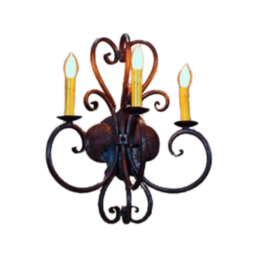 A decorative wall sconce featuring three candle-style bulbs atop ornate, swirling wrought iron arms. The design includes a central round fixture, showcasing elegant curves that enhance a classic ambiance.