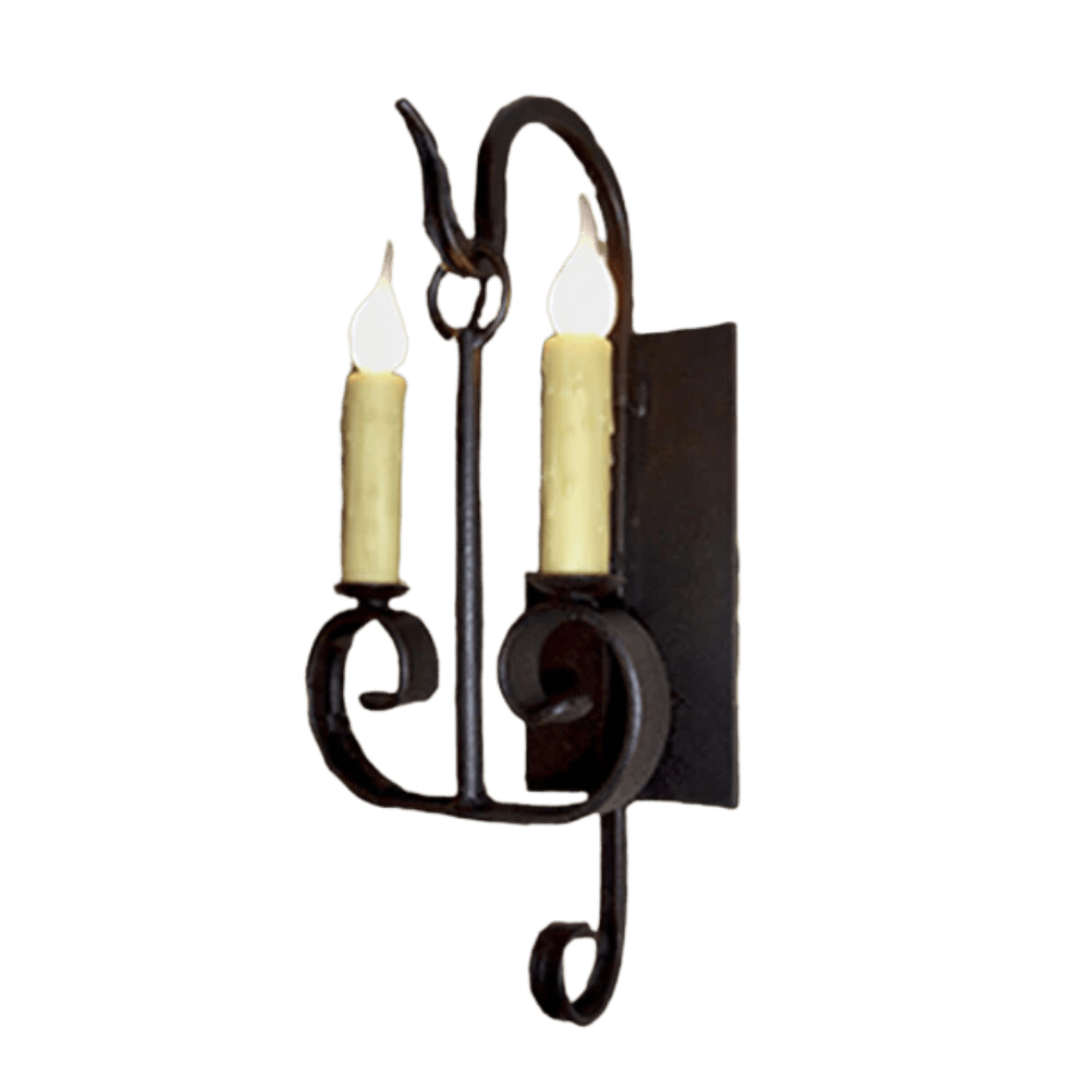 A handcrafted wall sconce featuring two warm candle-style bulbs. The design includes elegant swirling ironwork with a black finish, perfect for adding a touch of traditional charm to any space.