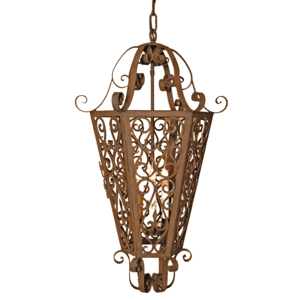 A beautifully crafted wrought iron pendant light featuring intricate scrollwork and a candle-style design. The warm finish enhances its ornate appearance, making it a stunning addition to any decor.