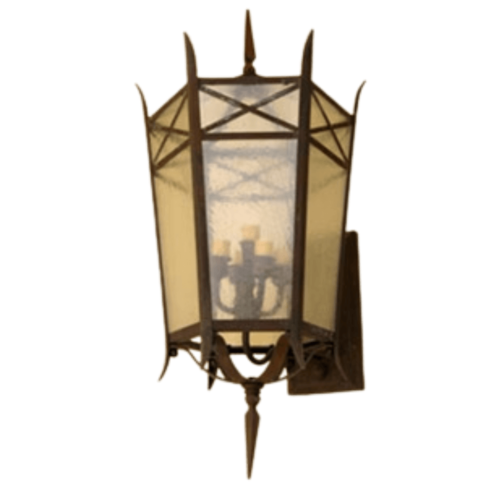 A beautifully crafted wrought iron sconce featuring a geometric design and a glass enclosure, showcasing an elegant candle-style light fixture inside.