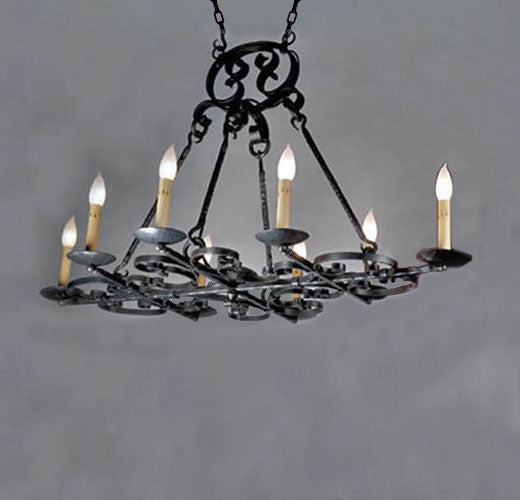 A rustic wrought iron chandelier featuring intricate scrollwork and traditional candle-style lights. It has a classic design that adds elegance to any space.
