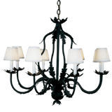 Elegant wrought iron chandelier featuring six arms adorned with decorative leaf motifs and soft, white fabric shades. The design combines traditional craftsmanship with timeless style, creating a warm ambiance. Perfect for dining areas or living spaces.