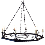 A sleek, eight-light chandelier featuring an intricate wrought iron design. It showcases elegant candle-style bulbs on a geometric frame, suspended by a chain. Ideal for adding a rustic yet sophisticated touch to any room.