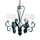 A detailed wrought iron chandelier featuring ornate scrollwork and five candle-like fixtures with white shades, providing a warm and inviting ambiance.