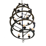 A striking chandelier featuring multiple circular levels adorned with candle-like bulbs. The intricate wrought iron design enhances any space, providing a warm, inviting glow. Ideal for enhancing rustic or elegant interiors.