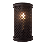 A beautifully crafted wrought iron sconce with intricate lattice detailing. The design allows light to filter through, creating captivating patterns on the surrounding surfaces. This fixture adds a touch of elegance and warmth to any space.