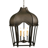 A decorative wrought iron pendant light featuring a rounded top and four candle-like bulbs within a detailed frame. The dark finish adds an elegant touch, perfect for enhancing any space.
