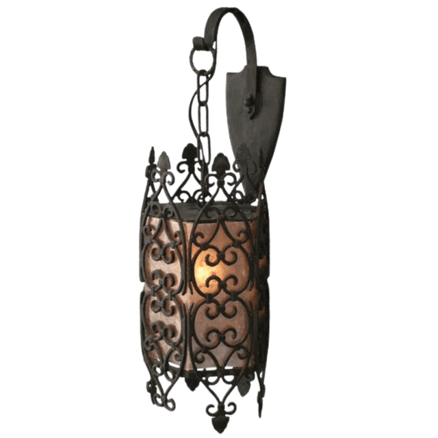 A decorative wrought iron sconce featuring intricate scrollwork and a warm, glowing inner light. The design showcases stylish curves and a classic aesthetic, perfect for enhancing any space with elegance.