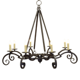 A decorative wrought iron chandelier featuring intricate scrollwork and six candle-like lights. Its elegant design adds a warm, inviting glow to any space.