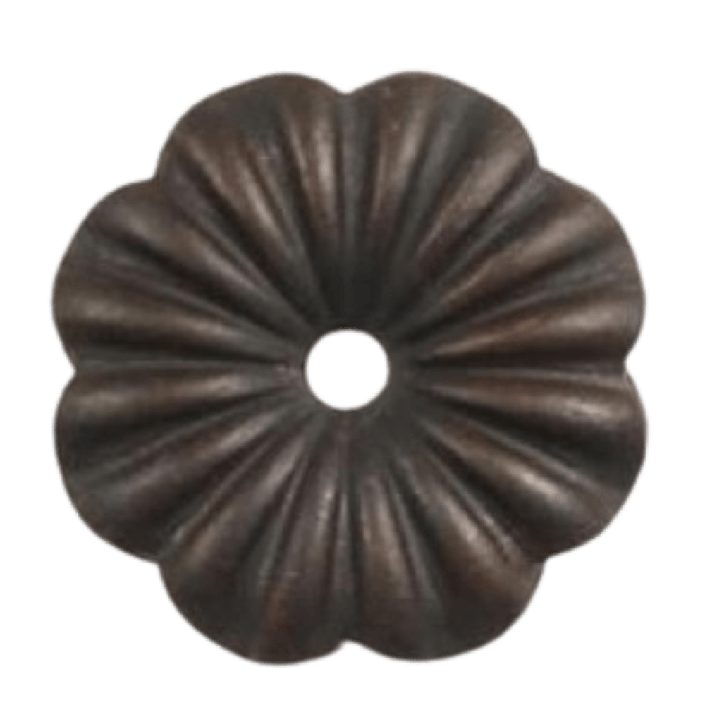 A decorative wrought iron ceiling canopy featuring a textured, fluted design with a circular hole at the center for light fixture attachment. The piece is finished in a dark hue, adding elegance to any lighting installation.
