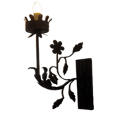 A beautifully crafted wrought iron sconce featuring ornate floral designs and a single light source, enhancing any interior with elegance and charm.