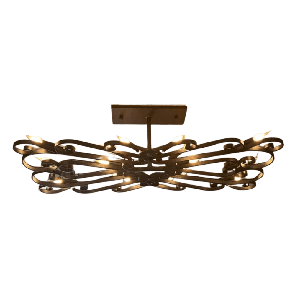 A stunning wrought iron chandelier featuring intricate scrollwork and multiple lights. The design showcases elegant curves and a warm, inviting glow, perfect for enhancing any interior space.