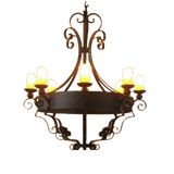 A stunning wrought iron chandelier featuring an elegant design with graceful curves and intricate detailing. It holds multiple glowing candle-like lights, providing warmth and character to any space. Ideal for adding a touch of vintage charm and ambient lighting.