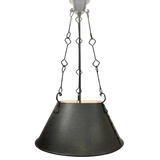 A distinctive hanging light fixture featuring a black, conical shade with a textured surface and meticulous metal detailing. The design includes decorative chains, enhancing its elegant appeal and making it suitable for various interiors. Ideal for adding warm illumination to dining areas or living spaces.