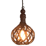A striking pendant light featuring an intricate woven design that showcases a warm, glowing bulb. The rustic style adds a cozy, elegant touch to any space, perfect for accentuating traditional decor.